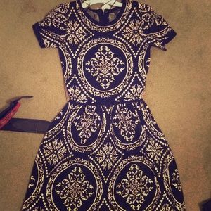 Black and cream patterned dress